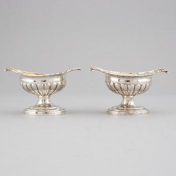 A pair of 19th century parcel-gilt silver salt-cellars, unidentified marks.