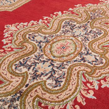 A carpet from Kerman, around 312 x 214 cm.