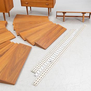 A teak and teak veneered shelf system, mid 20th century.