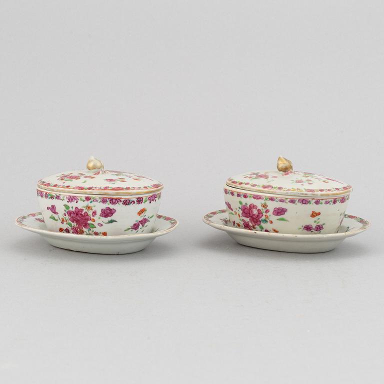 A pair of famille rose export porcelain butter tureens with dishes and covers, Qing dynasty, Qianlong (1736-95).