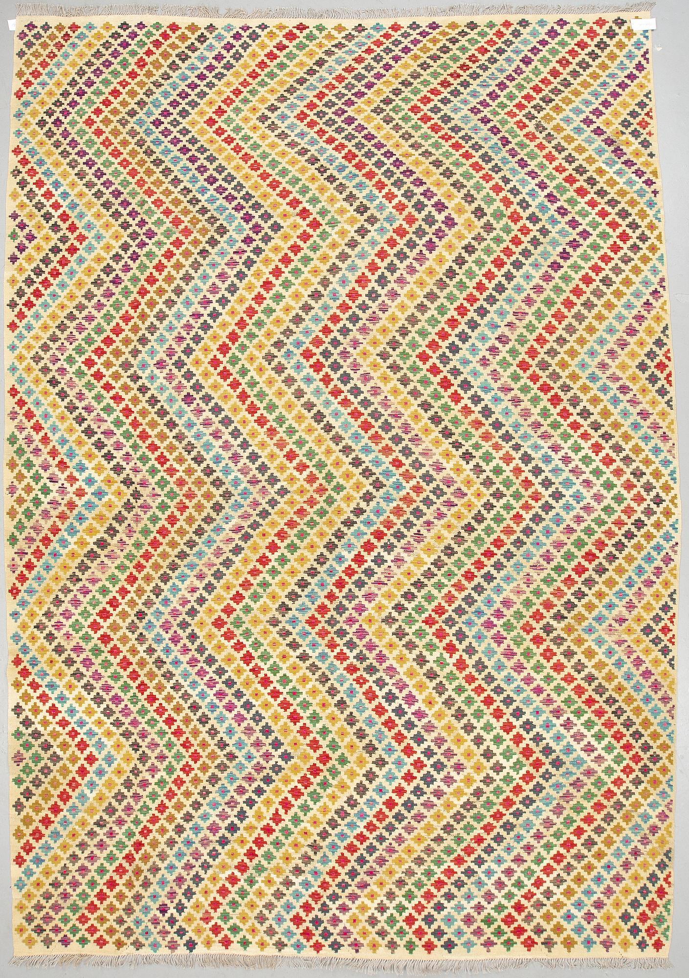 A CARPET, kilim, 397 x 287 cm.
