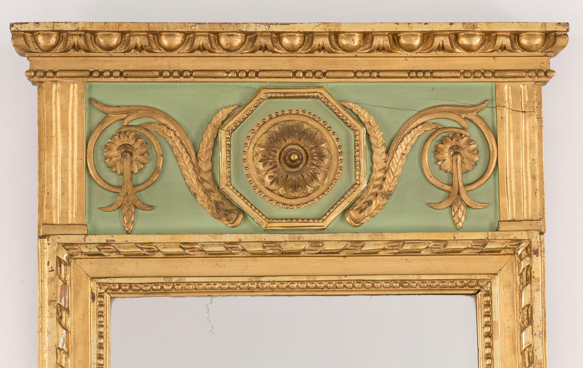 A late gustavian mirror, Stockholm hallmark 1793.