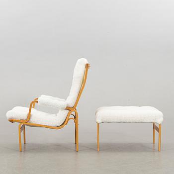 BRUNO MATHSSON, an "ingrid" armchair and stool for Dux. Late 20th century.