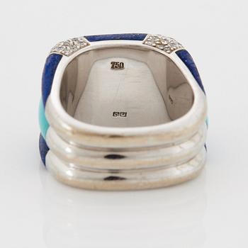 A Paul Binder ring in 18K white gold set with lapis lazuli, turquoise and round brilliant-cut diamonds.