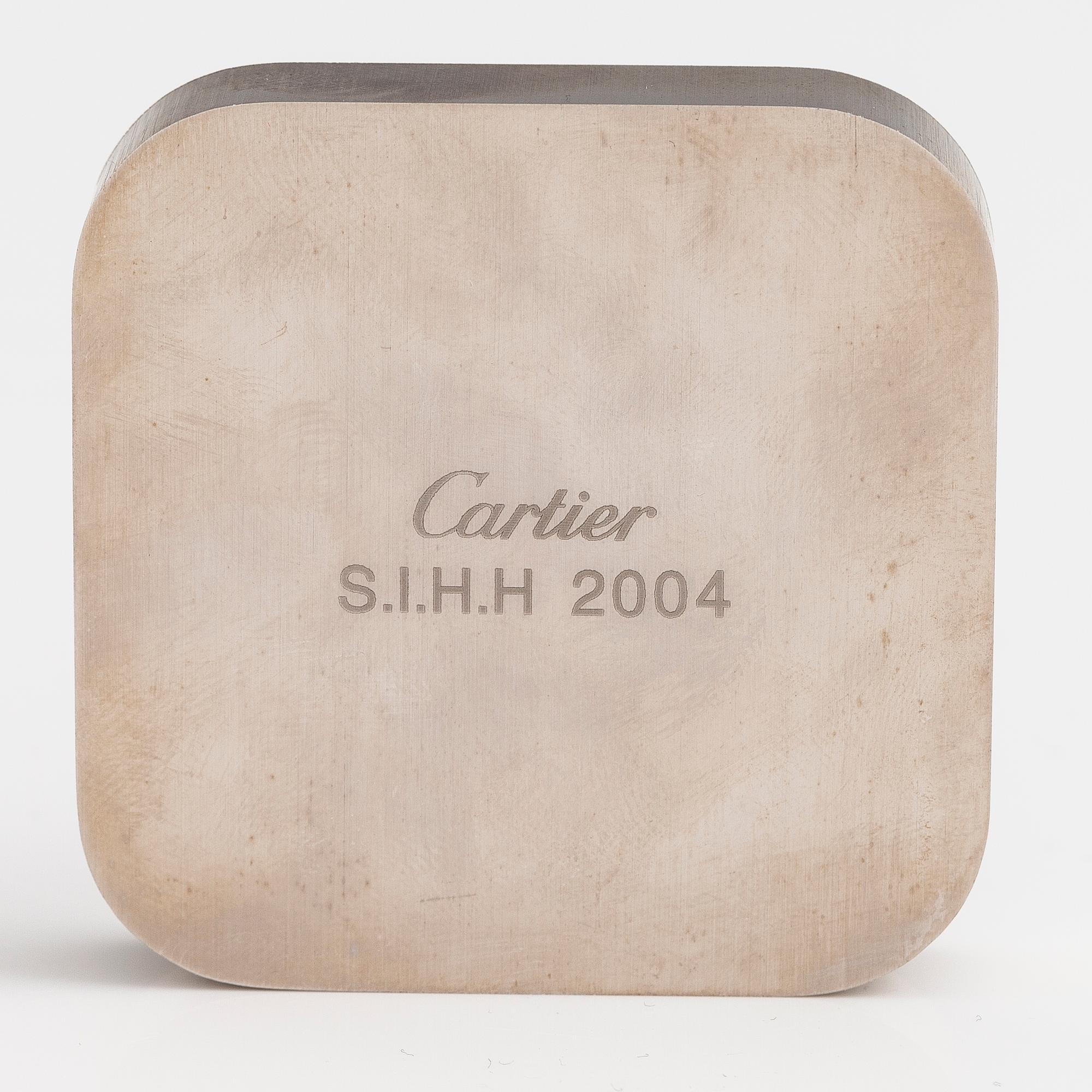 CARTIER, A brass compass with a palladium finish. S.I.H.H, 2004.