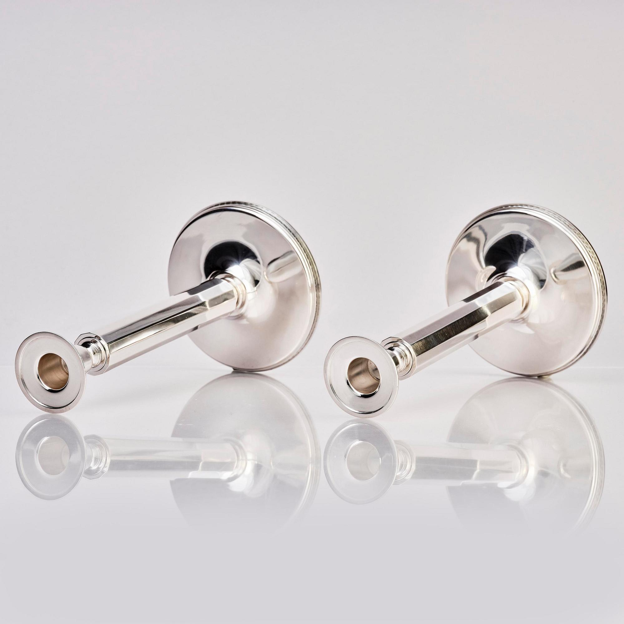 Atelier Borgila, a pair of sterling silver candlesticks, Stockholm 1982.