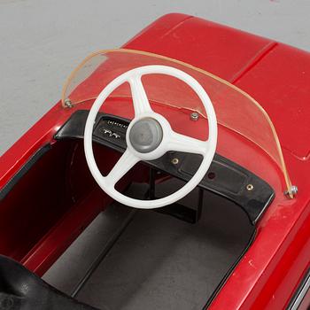 A pedal car from the 1970's.