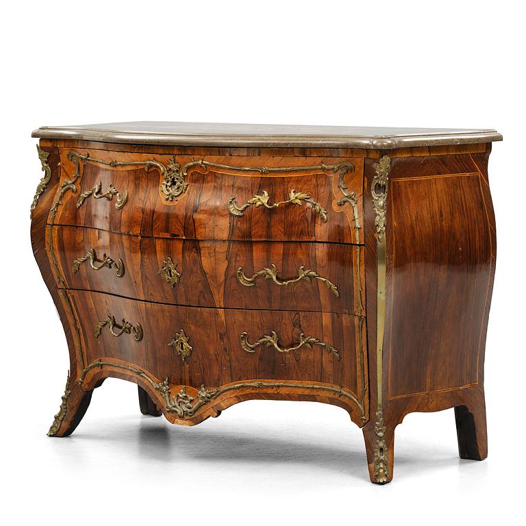 A rococo parquetry commode by C. G. Willkom (master in Stockholm 1763-65).