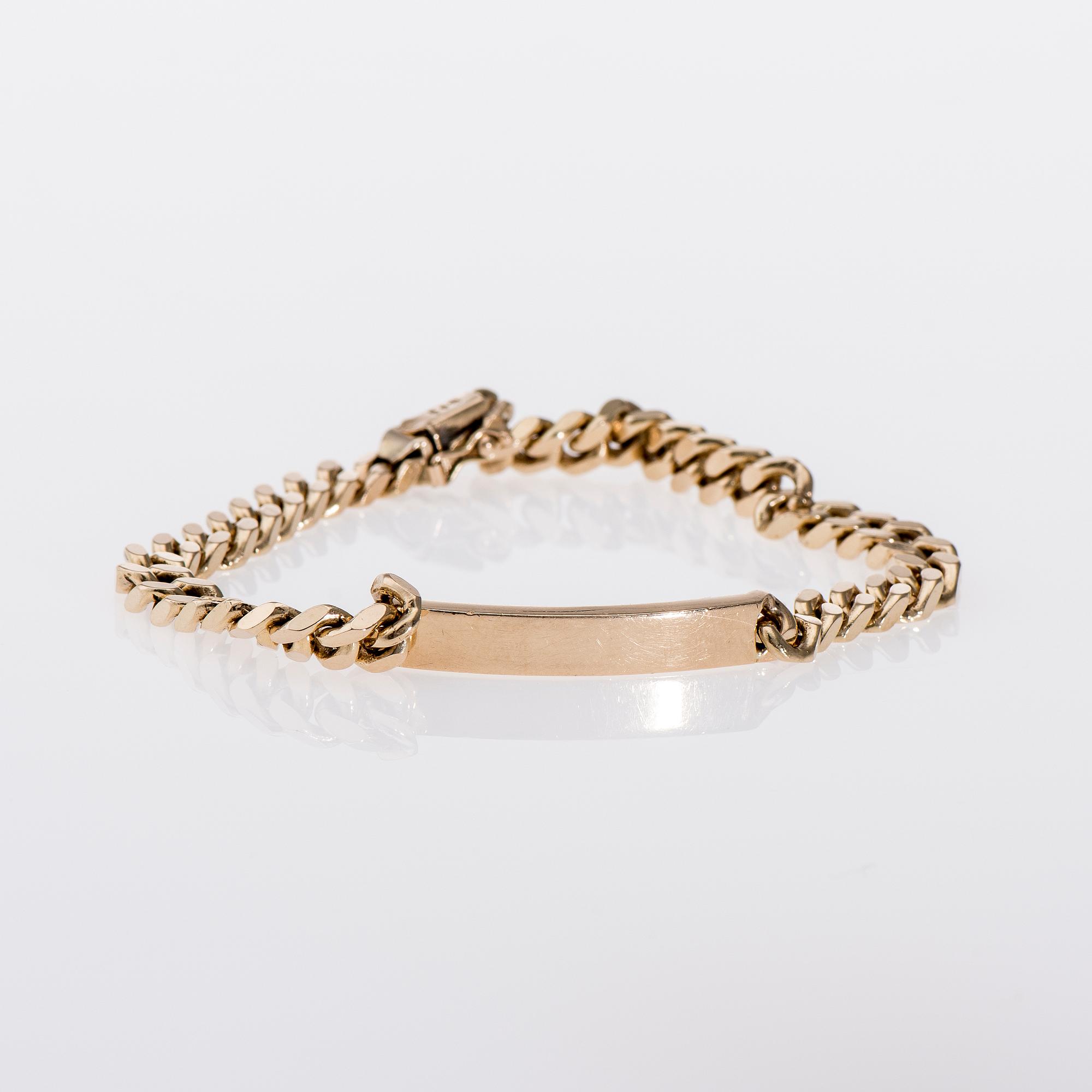 ARMBAND, 14K kultaa, pansarked. Vikt 38 g.