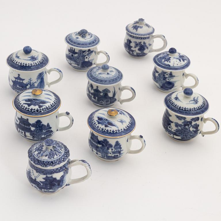 A set of nine nlue and white custard cups with covers, Qing dynasty, Qianlong (1736-95).