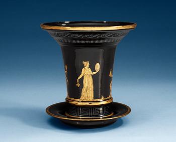 1209. A Russian gilt black Etruscan style glass cache-pot with stand, circa 1800.
