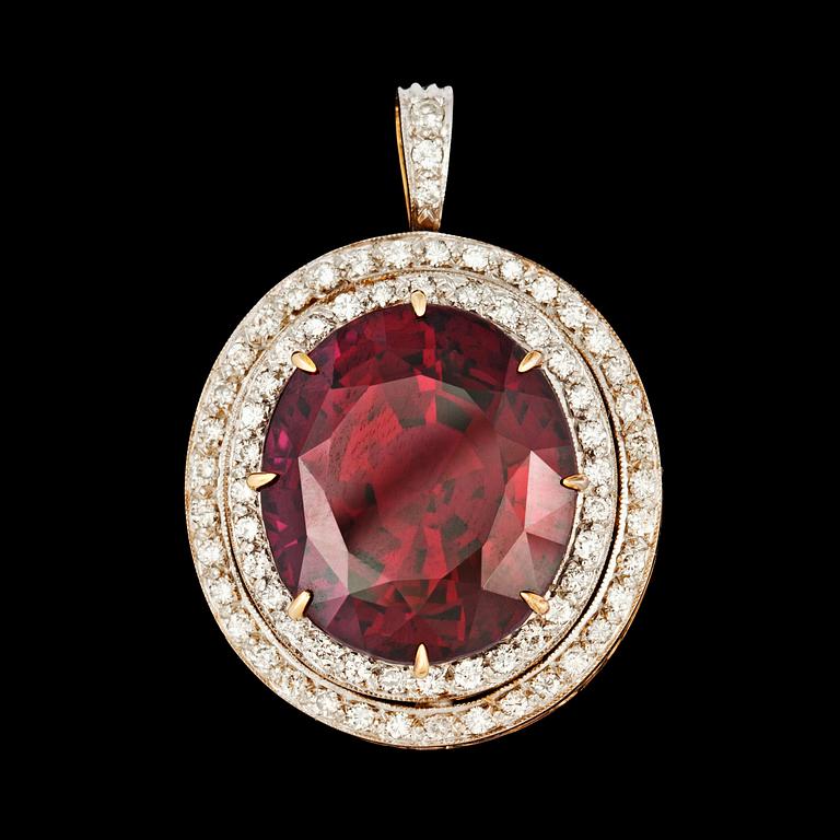 A garnet and brilliant cut diamond pendant, total carat weight circa 0.80 cts.