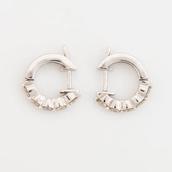 Brilliant cut diamond earrings.