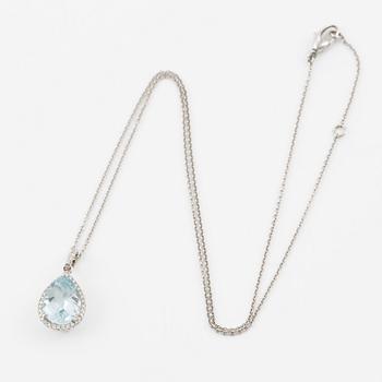 Pendant with chain in 18K white gold set with a faceted aquamarine and round brilliant-cut diamonds.