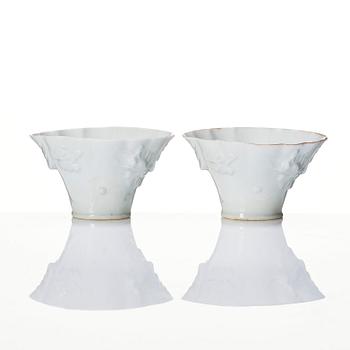 A pair of blanc de chine libation cups, Qing dynasty, 19th Century.