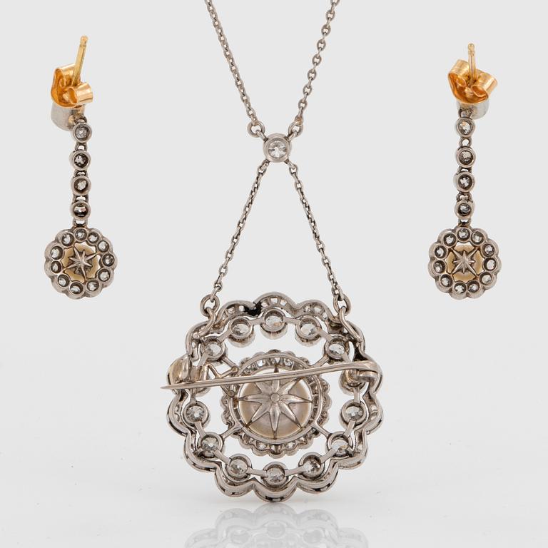 A necklace/brooch and a pair of earrings in platinum and gold set with pearls and old- and rose-cut diamonds.