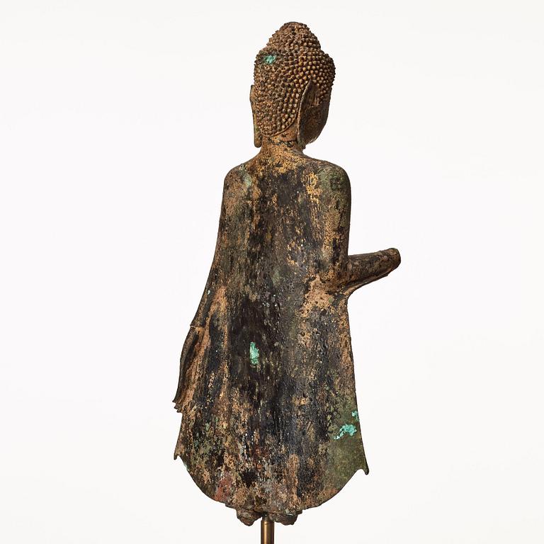 A standing figure of Buddha, Thailand, 18th Century.