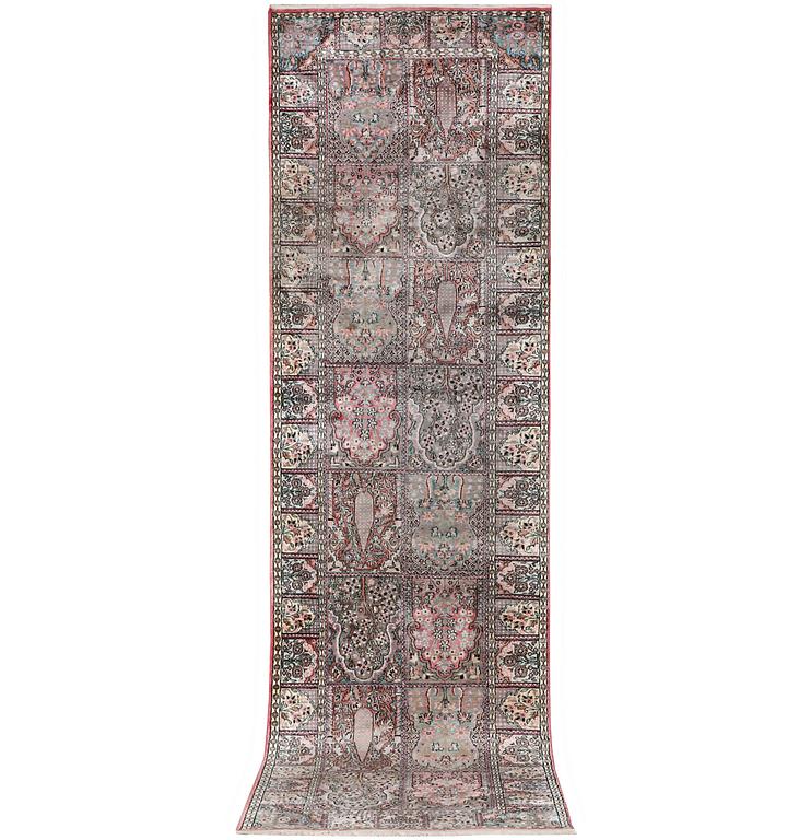 A Kashmir runner carpet, silk, c. 364 x 97 cm.