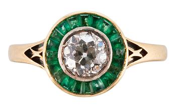 416. A DIAMOND / EMERALD RING 0,75 ct.