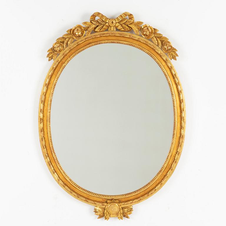 A Gustavian style mirror, mid 20th Century.