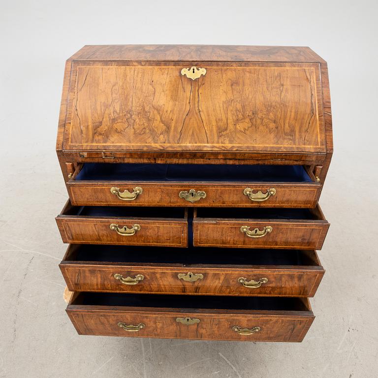 A walnut and mahogany writing bureau, mid-18th century late Baroque.