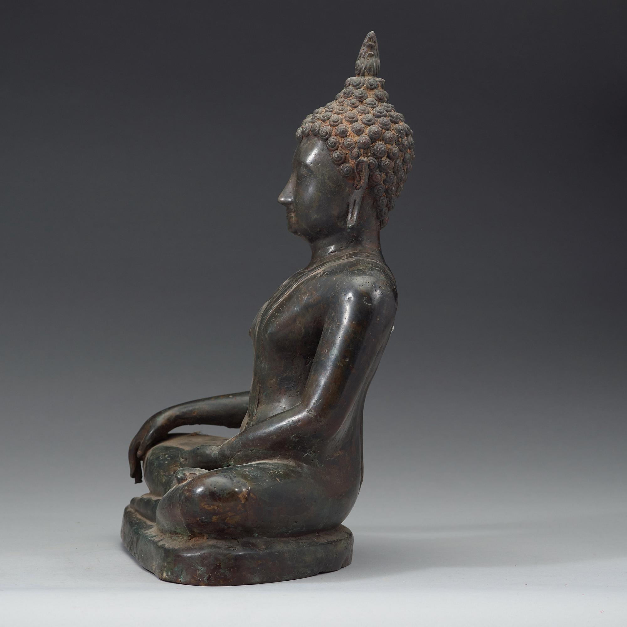 A seated bronze Buddha, Thailand, presumably Lanna, 15th/16th Century.