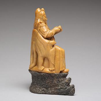 KRIGSGUDOM, soapstone. Qingdynastin, 1800-tal.