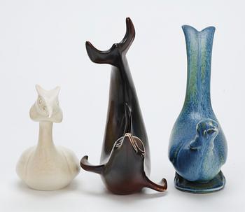 Three Gunnar Nylund stoneware figures, a dolphin, a pheasant and a great crested grebe, Rörstrand.