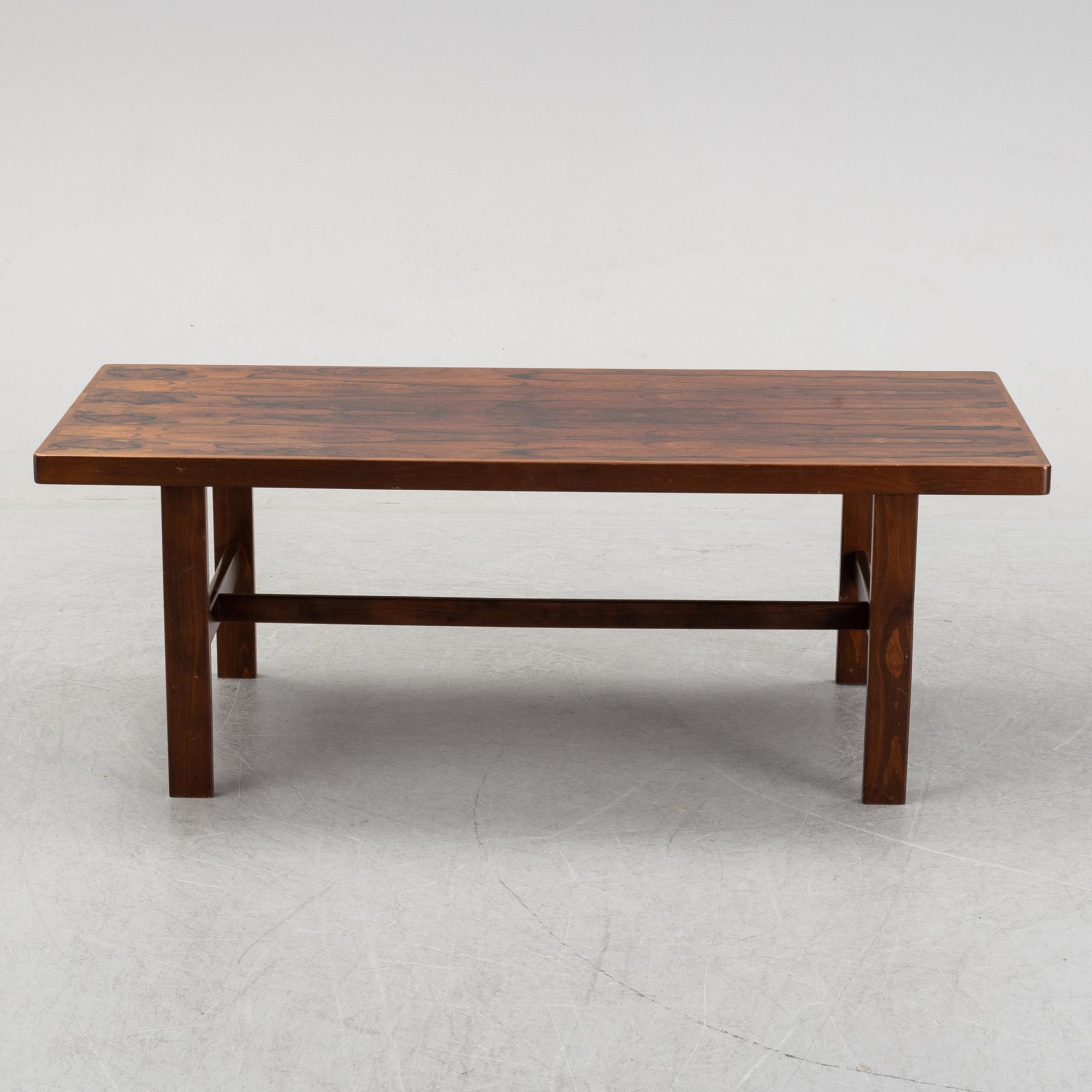 A rosewood coffee table, 1960's-80's.
