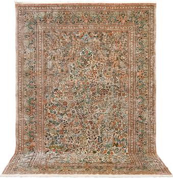 An oriental pictoral silk rug, approx. 280 x 183 cm.