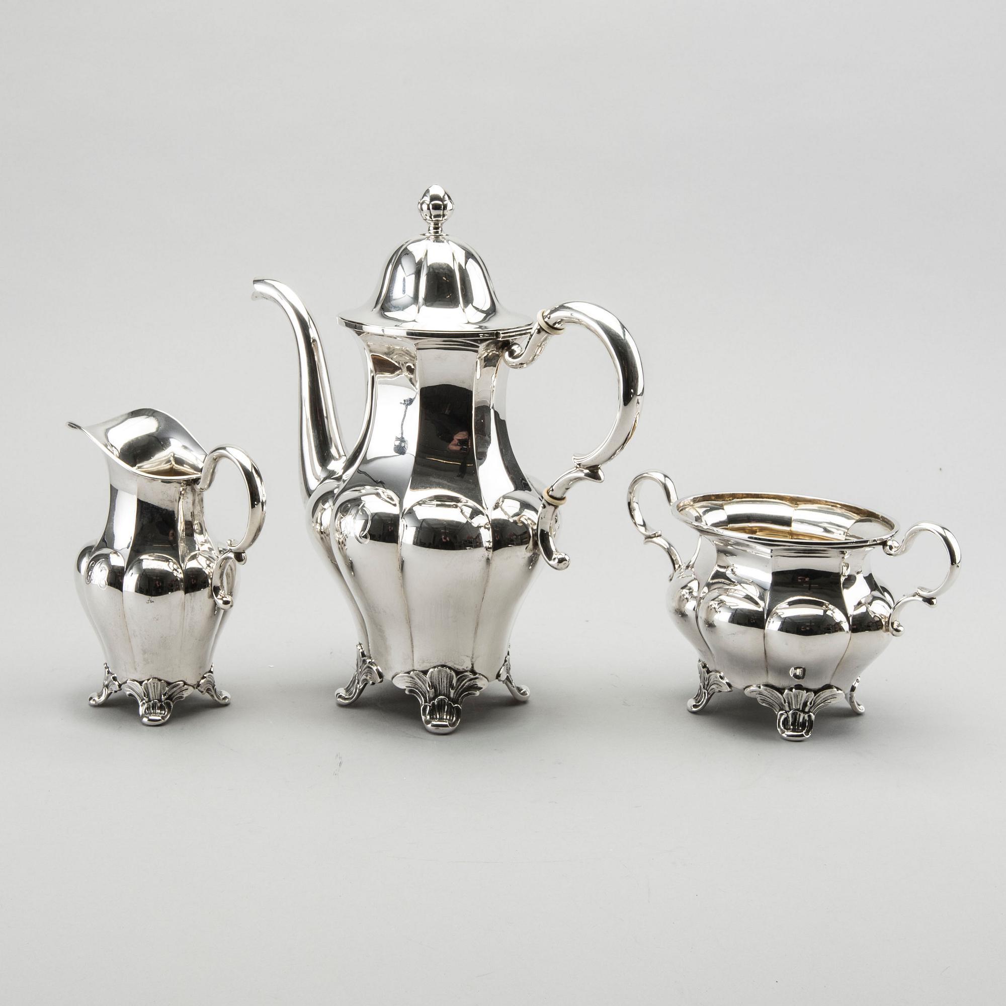 A three piece silver coffee service byGAB AB 1932-33, 1330g.