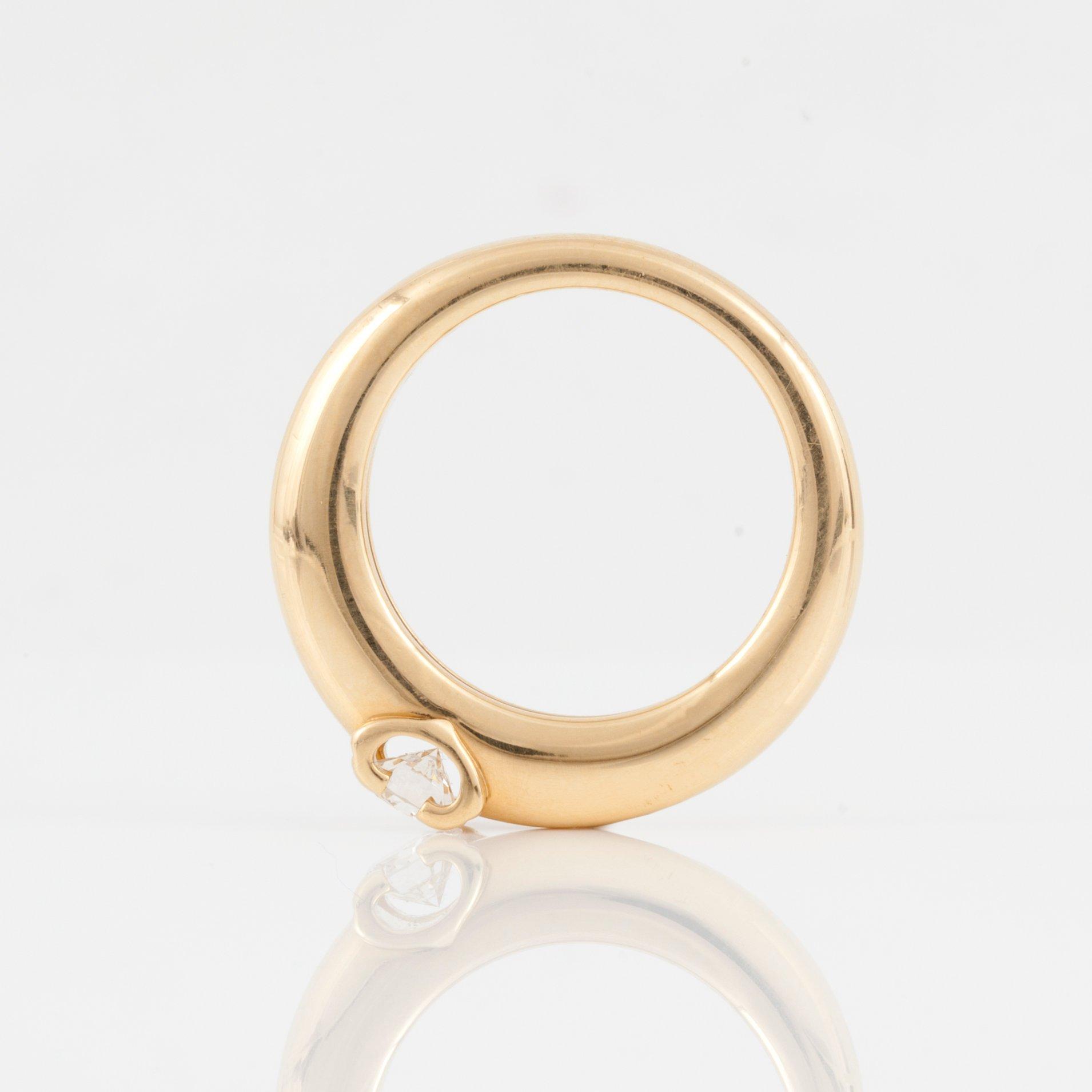 RING, signerad Cartier, Serienummer: 54KQ030, med briljantslipad diamant ca 0.35 ct. Kvalitet ca G-H/VS1.