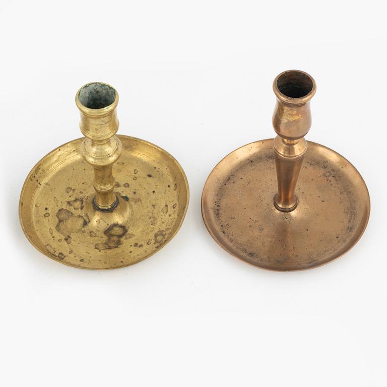 Four bronze candlesticks, a pair of which Skultuna model N 60, 18th-19th Century.