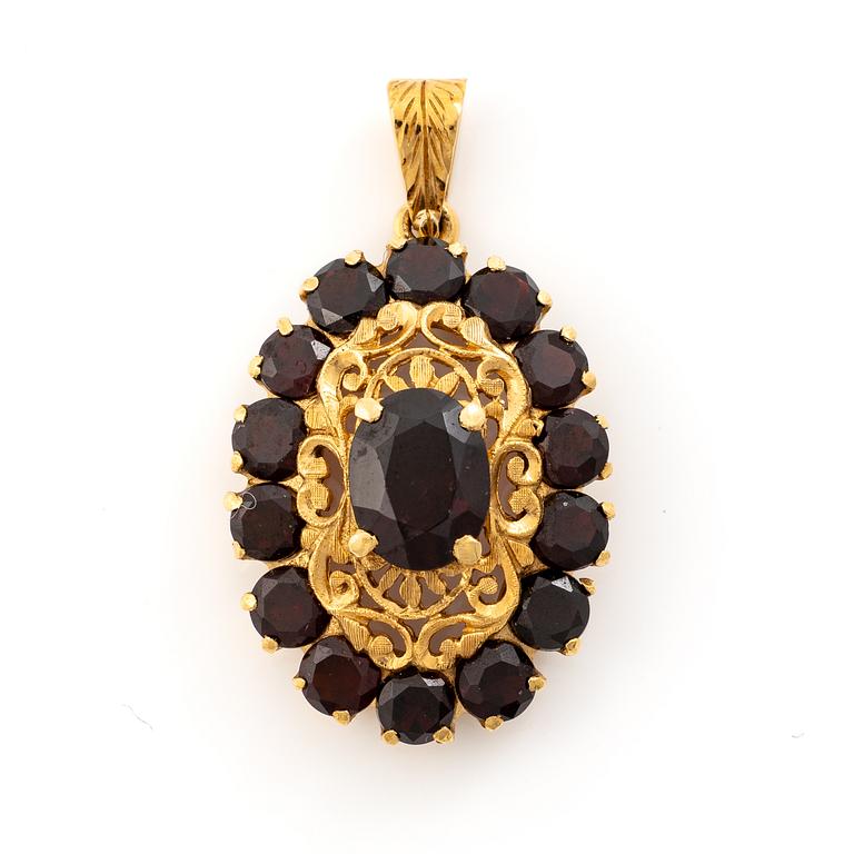 Pendant, 18K gold with garnets.