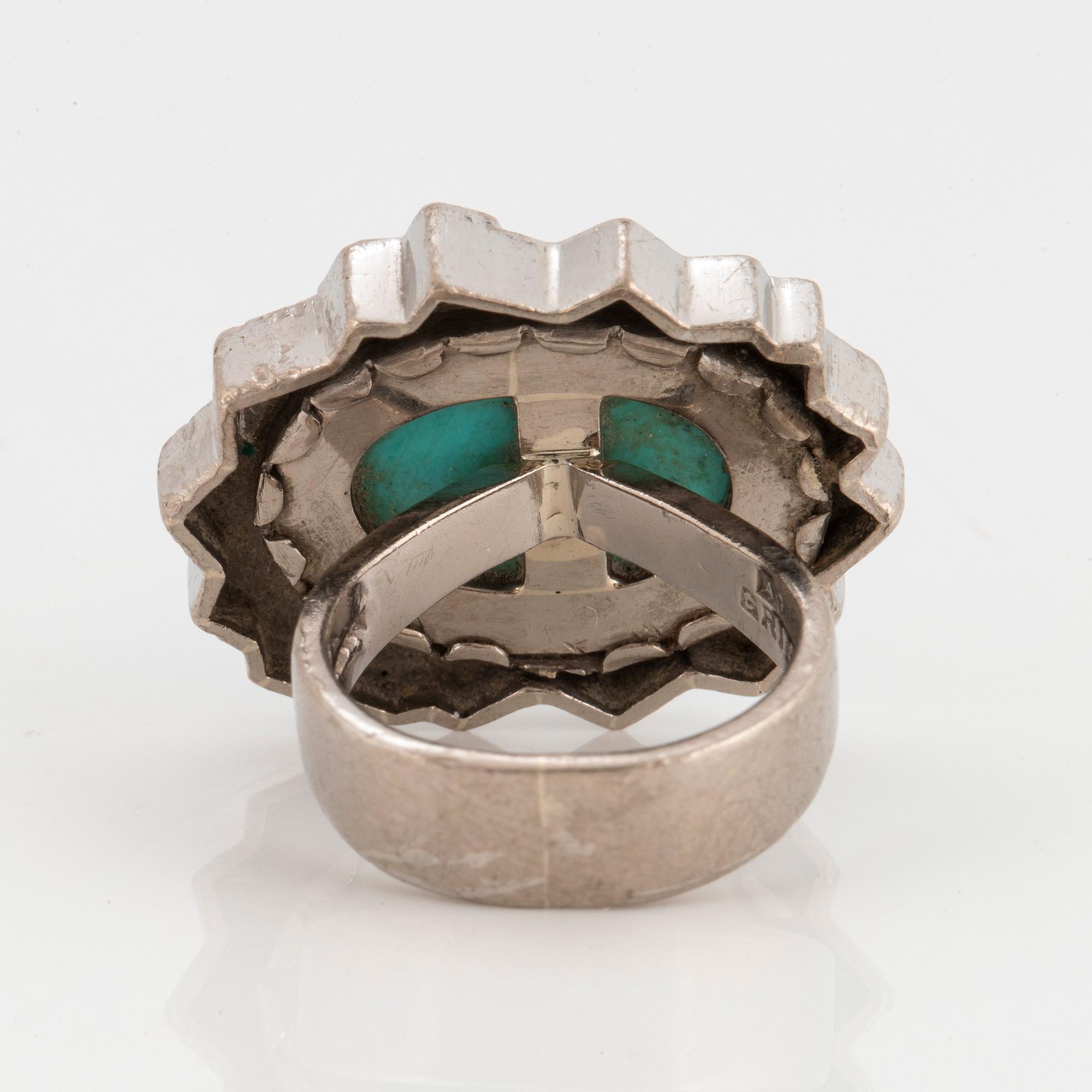 Grima ring 14K vitguld med turkos och runda briljantslipade diamanter.