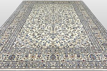 A Keshan carpet, c. 350 x 240 cm.