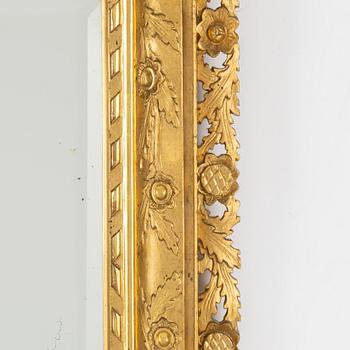 A 20th century Baroque style mirror.