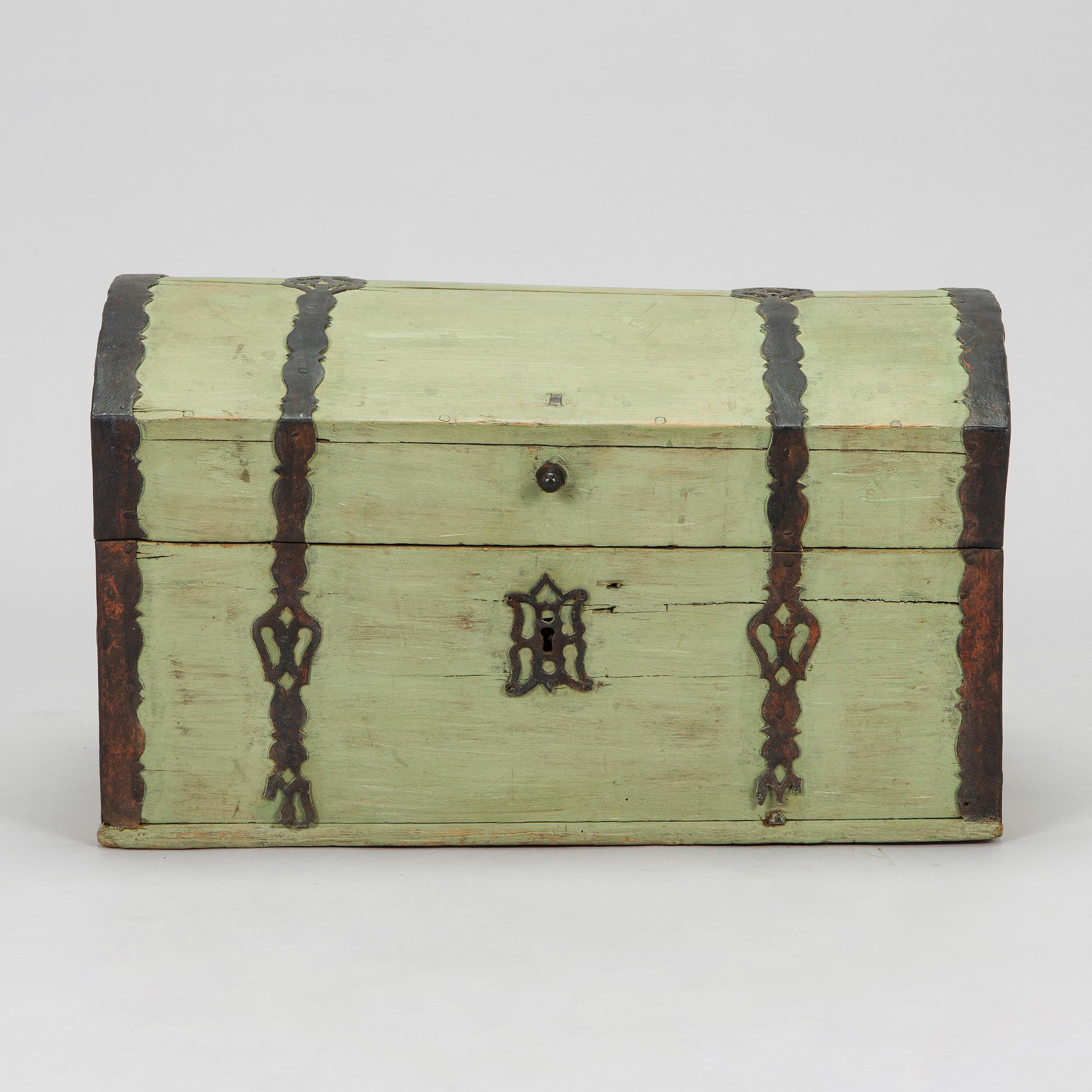 A wooden storage chest dated year 1777.
