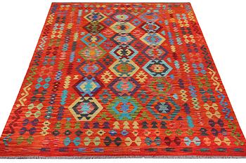 A Kilim carpet, c. 292 x 203 cm.