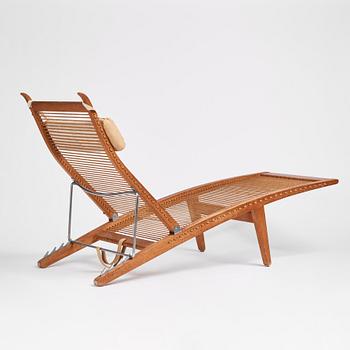 Hans J. Wegner, an oak lounge chair model "JH 524", Johannes Hansen, Copenhagen.