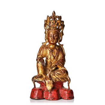 856. A gilded and lacquered bronze fiugre of Guanyin/Avalokitesvara, Ming dynasty (1368-1644).