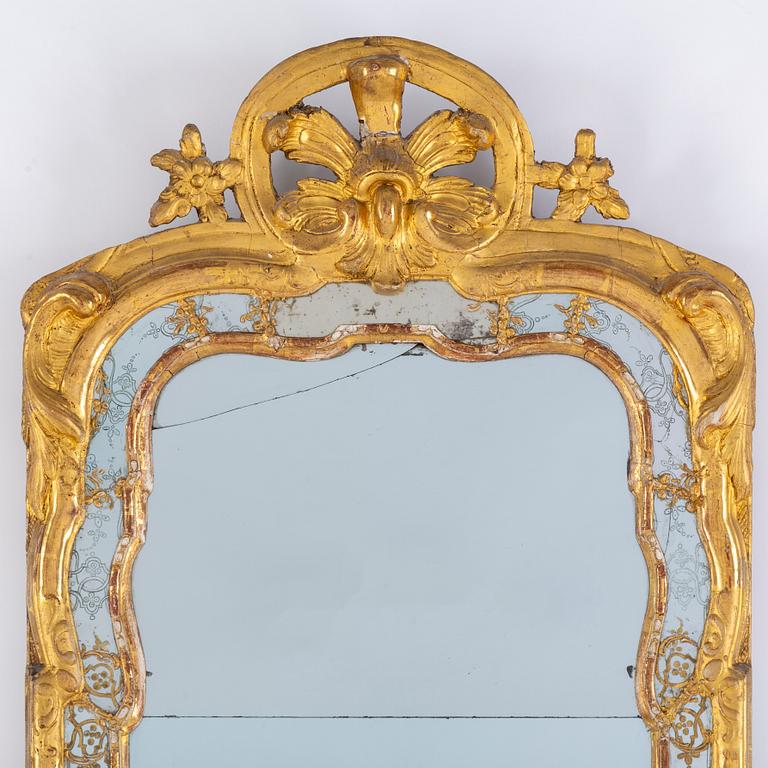 An 18th century rococo mirror.
