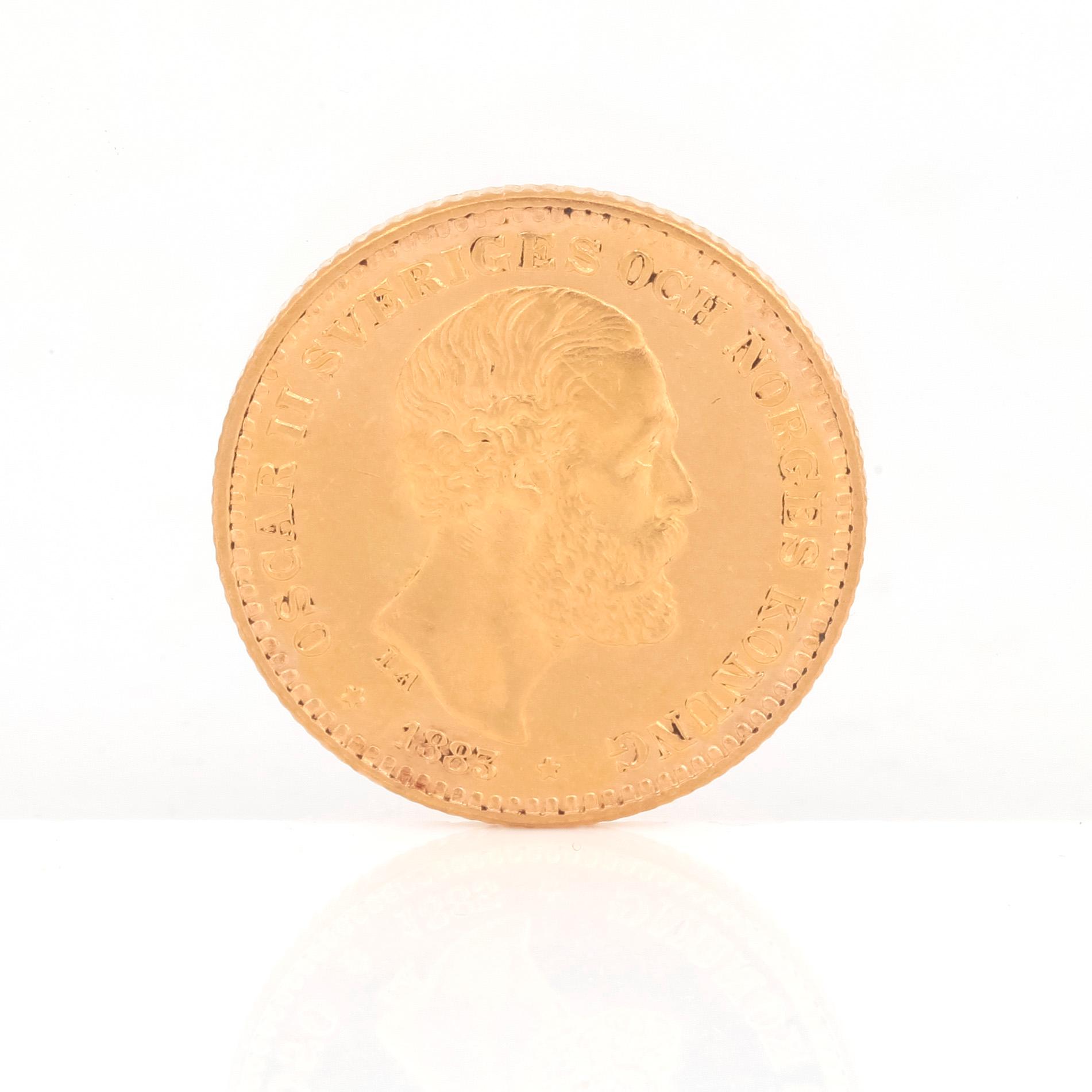 GULDMYNT, 10 kronor, Oscar II av Sverige och Norge 1883. Vikt ca 4,5 gram.