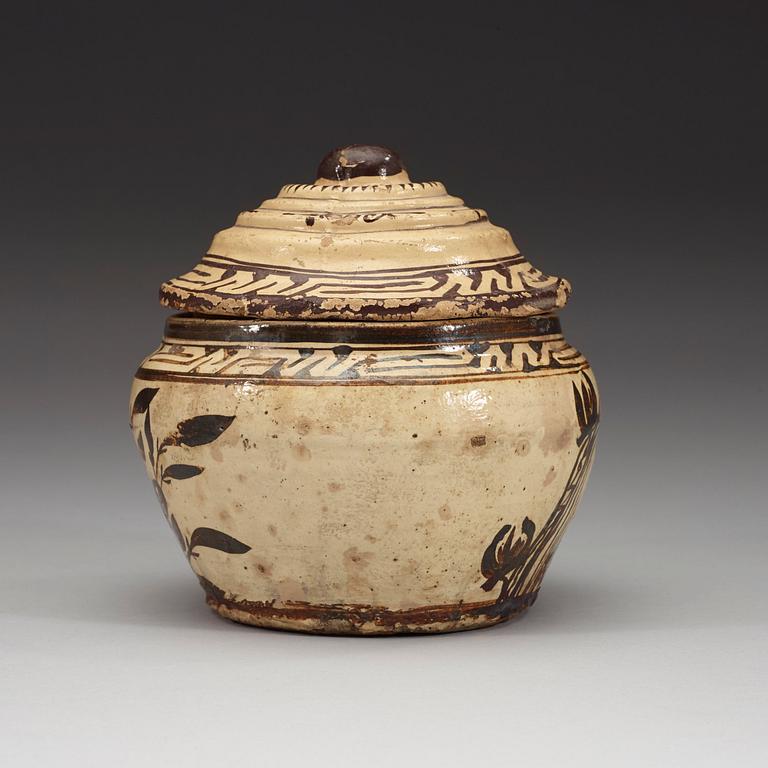 A Cizhou ware pot with cover, presumably Yuan dynasty (1260-1370).