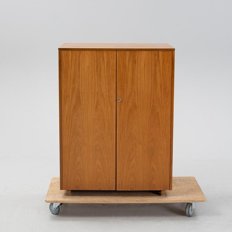 A teak veneered 'Home Office', Newcraft Ltd, England, second half of the 20th Century.