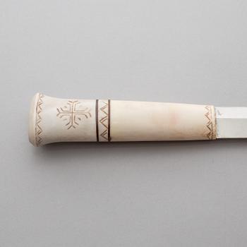 A SAMI KNIFE by Johannes Lauri, Rovaniemi, bone and leather, 20th century.