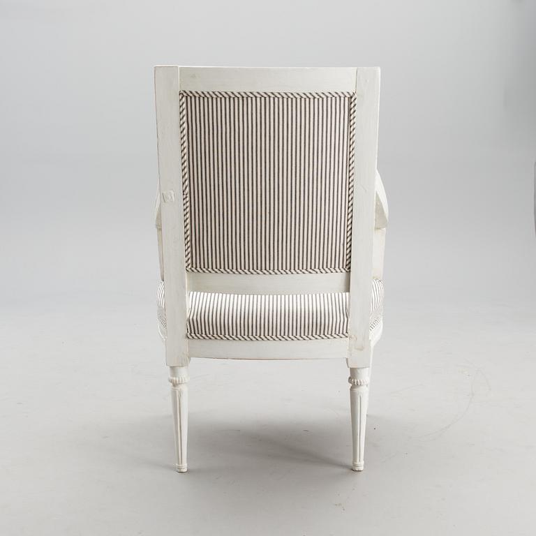 A late 18th century Swedidh Gustavian open arm chair.