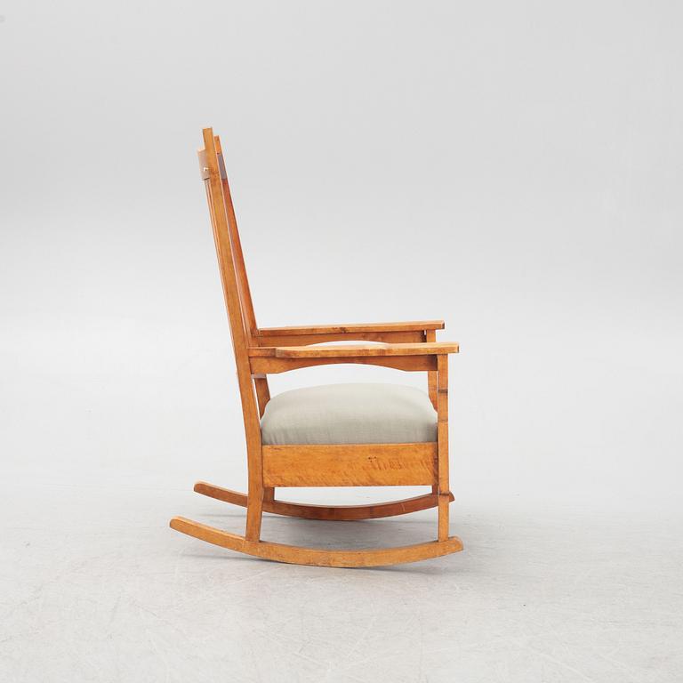 Gustav Stickley, after. A 'Bungalow Rocker' rocking chair, early 20th Century.