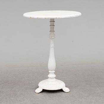 an early 20th century cast iron table.