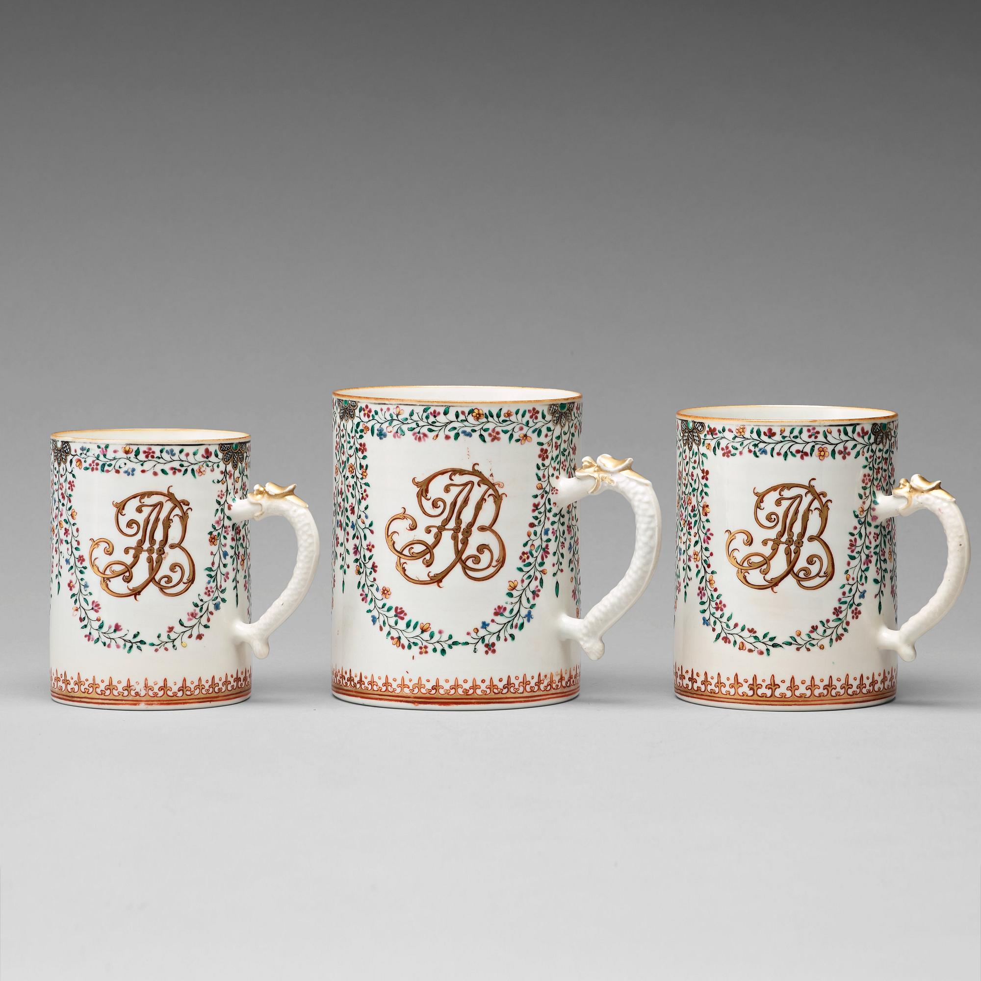 A group of three famille rose armorial jugs, Qing dynasty, Qianlong (1736-95).